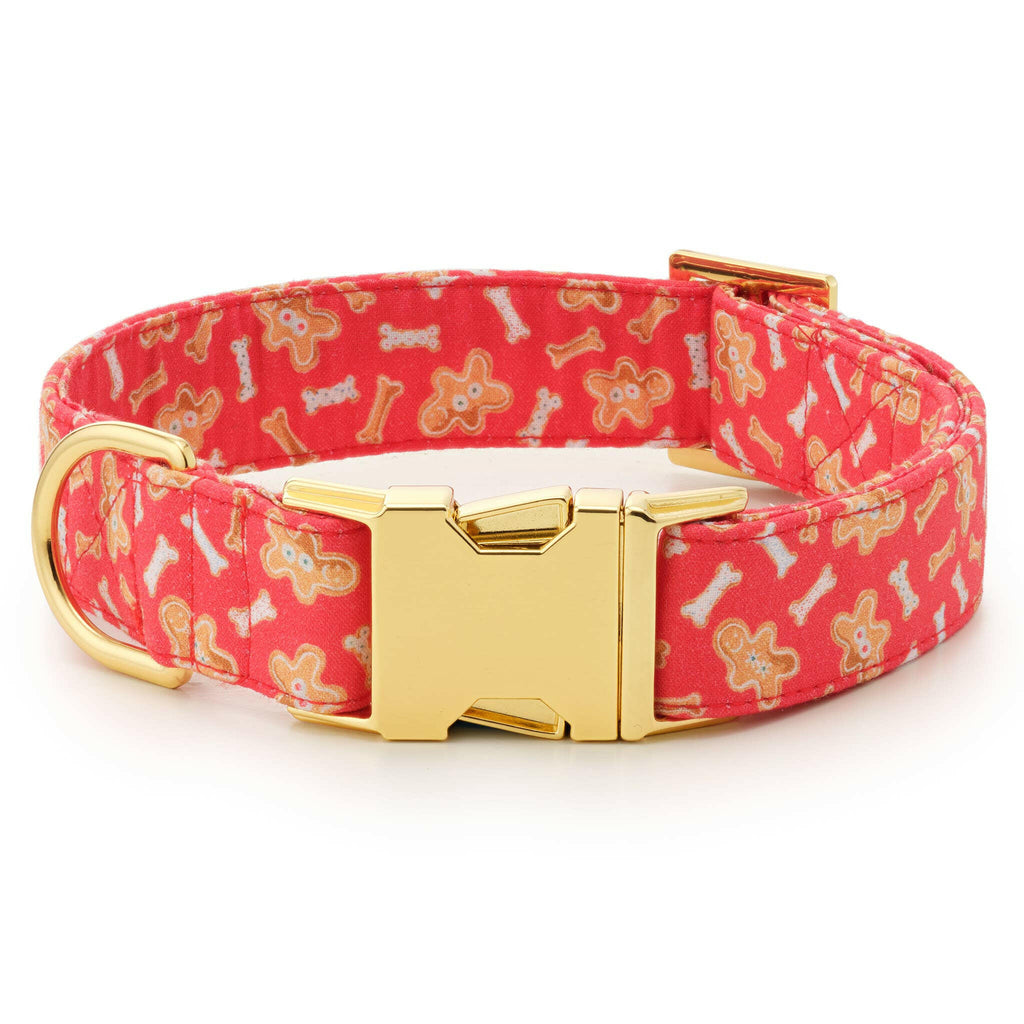 red dog collar with white bones and gingerbread cookies design with gold hardware 